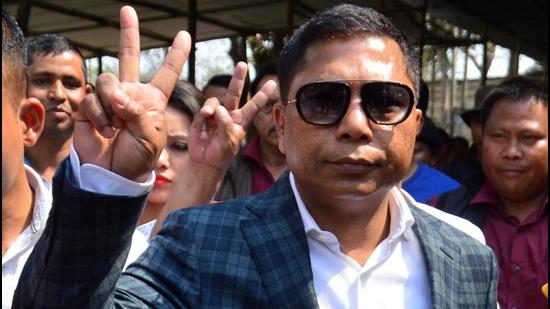 Ampati: Meghalaya Chief Minister and Congress candidate Mukul Sangma flashes victory sign after winning in his constituency in the Meghalaya Assembly elections at Ampati in South-West Garo Hills on Saturday. Sangma also emerged as Songsak constituency winner. PTI Photo (PTI3_3_2018_000062B) (PTI)