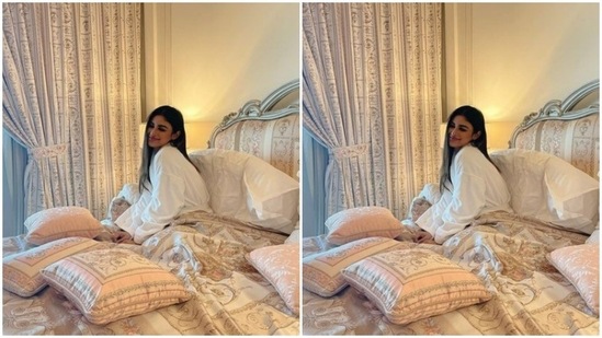 Mouni posed beside her window in between multiple pillows.(Instagram/@imouniroy)