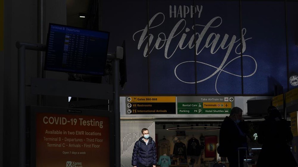 Holiday signs and decorations are displayed at Newark Liberty International Airport in Newark, N.J., Tuesday, Nov. 23, 2021. (AP Photo/Seth Wenig) Holiday signs and decorations are displayed at Newark Liberty International Airport in Newark, N.J., Tuesday, Nov. 23, 2021. (AP Photo/Seth Wenig)