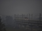 A view of Yamuna Bank near National Highway 24 on Friday. According to the System of Air Quality and Weather Forecasting And Research (Safar), relief is expected from November 29 onwards, when surface winds touch 15-20 km/hr. (Sanjeev Verma/HT PHOTO)