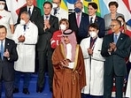 Medical personnel and world leaders pose for a group photo at the La Nuvola conference center for the G20 summit in Rome in October. AP Medical personnel and world leaders pose for a group photo at the La Nuvola conference center for the G20 summit in Rome in October. AP