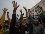 Farmers celebrate at a protest site in Singhu, Delhi, after Narendra Modi announced the Centre's decision to repeal the farm laws. Farmers celebrate at a protest site in Singhu, Delhi, after Narendra Modi announced the Centre's decision to repeal the farm laws. 