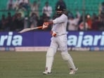 India's Ravindra Jadeja gestures after scoring fifty runs during the day one of their first test cricket match with New Zealand in Kanpur, India, Thursday, Nov. 25, 2021.(AP)