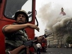 Smoke is seen billowing out of the ground and first floor of the Taj Hotel in south Mumbai during security personnel's Operation Cyclone following the 26/11 terror attacks in 2008. (File Photo / HT) Smoke is seen billowing out of the ground and first floor of the Taj Hotel in south Mumbai during security personnel's Operation Cyclone following the 26/11 terror attacks in 2008. (File Photo / HT)