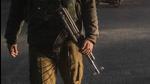 A policeman keeps guard at a site in Srinagar, Jammu and Kashmir, on Wednesday. (AP) A policeman keeps guard at a site in Srinagar, Jammu and Kashmir, on Wednesday. (AP)