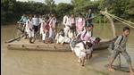 Students get off a boat after crossing the Rind river to reach their school in Fatehpur district, Uttar Pradesh. (PTI/File) Students get off a boat after crossing the Rind river to reach their school in Fatehpur district, Uttar Pradesh. (PTI/File)