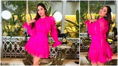 Janhvi Kapoor's playful fuchsia pink skirt set is the perfect outfit for a casual outing. (Instagram/@tanghavri) Janhvi Kapoor's playful fuchsia pink skirt set is the perfect outfit for a casual outing. (Instagram/@tanghavri)