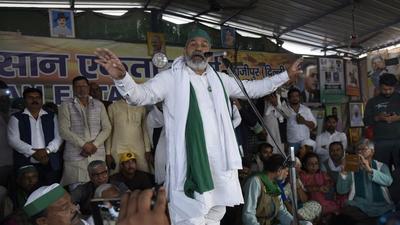 Farmer leader Rakesh Tikait was addressing a gathering of farmers at the UP Gate protest site in Ghaziabad on Friday (November 26) on completion of one year of the farmers’ protest against the three controversial farm laws passed by the Parliament. (Sakib Ali/HT photo) Farmer leader Rakesh Tikait was addressing a gathering of farmers at the UP Gate protest site in Ghaziabad on Friday (November 26) on completion of one year of the farmers’ protest against the three controversial farm laws passed by the Parliament. (Sakib Ali/HT photo)
