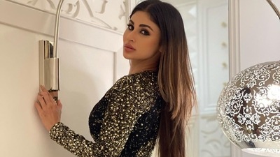 Mouni Roy slays a figure defining silhouette in ₹83k gold, black sequins dress (Instagram/imouniroy) Mouni Roy slays a figure defining silhouette in ₹83k gold, black sequins dress (Instagram/imouniroy)