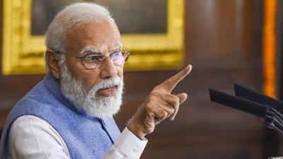 Prime Minister Narendra Modi speaks in Parliament in New Delhi on Friday. (PTI)