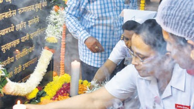 Nurses pay homage to the victims at Cama Hospital, one of the places targeted by the terrorists on 26/11 terror attacks, in Mumbai, on Friday. (HT PHOTO/BHUSHAN KOYANDE) Nurses pay homage to the victims at Cama Hospital, one of the places targeted by the terrorists on 26/11 terror attacks, in Mumbai, on Friday. (HT PHOTO/BHUSHAN KOYANDE)