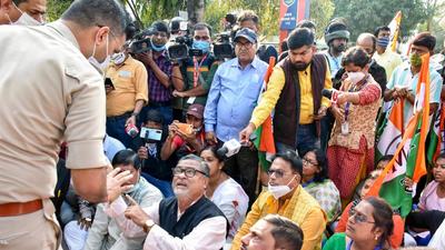 Tripura TMC convener Subal Bhowmik and his supporters stage a protest in front of the East Agartala police station during the municipal corporation elections in Agartala on Thursday. The party moved SC on Friday, seeking postponement of the counting of votes. (PTI) Tripura TMC convener Subal Bhowmik and his supporters stage a protest in front of the East Agartala police station during the municipal corporation elections in Agartala on Thursday. The party moved SC on Friday, seeking postponement of the counting of votes. (PTI)