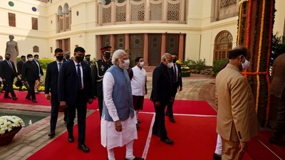 Prime Minister Modi, and President Kovind walk towards central hall of the Parliament for a joint session to observe Constitution Day on November 26, 2021. (AP) Prime Minister Modi, and President Kovind walk towards central hall of the Parliament for a joint session to observe Constitution Day on November 26, 2021. (AP)