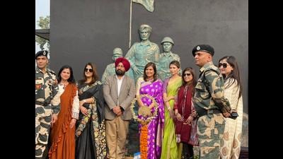 BSF and civil administration officials at the monument at the Attari integrated check post in Amritsar.