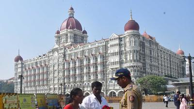 The Maharashtra Police Boys Sanghatana pays tribute to the martyrs of the 26/11 terror attacks on its 13th anniversary, at the Gateway of India, in Mumbai, India, on Friday. (HT PHOTO) The Maharashtra Police Boys Sanghatana pays tribute to the martyrs of the 26/11 terror attacks on its 13th anniversary, at the Gateway of India, in Mumbai, India, on Friday. (HT PHOTO)