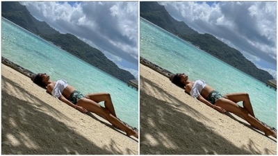 Pooja's beachwear collection is drool-worthy. A few days back, Pooja chilled on the beach in a white cropped top and a pair of white and green pair of shorts. (Instagram/@poojabatra)