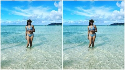Here's a picture of Pooja matching the backdrop in her blue bikini. (Instagram/@poojabatra)