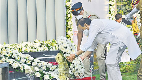 Maharashtra deputy chief minister Ajit Pawar pays tribute by placing wreath at the Police Martyrs Memorial at CP Office, on the 13th anniversary of the 26/11 terror attacks, in Mumbai on Friday. (HT PHOTO/BHUSHAN KOYANDE)