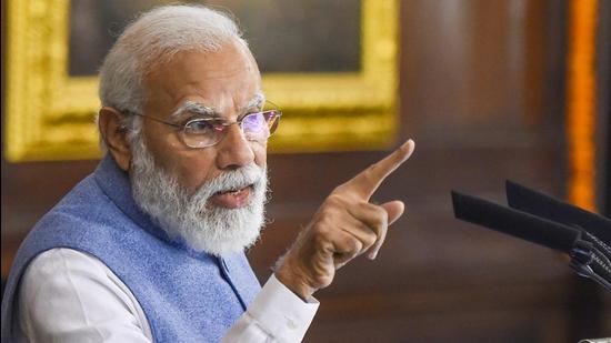 Prime Minister Narendra Modi speaks in Parliament in New Delhi on Friday. (PTI)