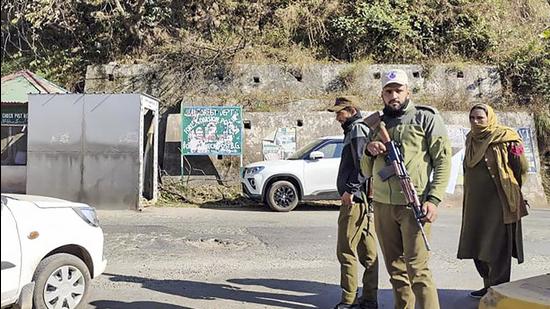 Security personnel stand guard at Bhimber Gali area of Poonch on Friday. Security forces killed one infiltrator near the Line of Control in Poonch district on Thursday night. (PTI)