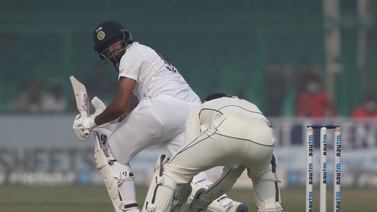India's Ravichandaran Ashwin plays a shot during the day two of their first test cricket match with New Zealand in Kanpur, India, Friday, Nov. 26, 2021. (AP Photo/Altaf Qadri)(AP)