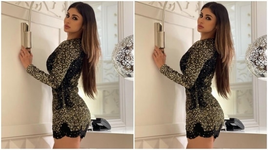 Mouni played muse to fashion designer Rocky Star and decked up in a short black dress.(Instagram/@imouniroy)