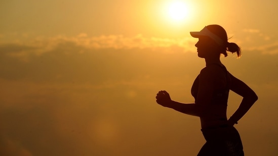 Light workout: You might not feel like working out but it is important to practise some light exercises and yogas to ease the pain and get rid of your bloating.(Pexels)