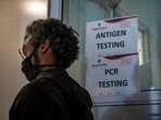 A person queues to be tested for Covid-19 in Johannesburg, South Africa, on November 26, 2021. (For representation purpose) (AP Photo/Jerome Delay) A person queues to be tested for Covid-19 in Johannesburg, South Africa, on November 26, 2021. (For representation purpose) (AP Photo/Jerome Delay)