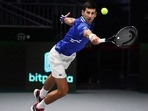 Serbia's Novak Djokovic returns a backhand. (Getty) Serbia's Novak Djokovic returns a backhand. (Getty)