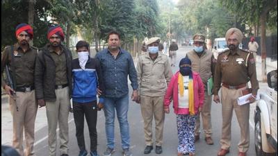 The couple, who was childless, had kidnapped the ragpicker’s son eight days ago in Ludhiana. They were arrested from a forest area in Lakhimpur Kheri near the Nepal border. (HT Photo) The couple, who was childless, had kidnapped the ragpicker’s son eight days ago in Ludhiana. They were arrested from a forest area in Lakhimpur Kheri near the Nepal border. (HT Photo)