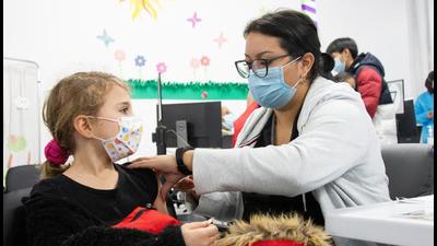 Nine-year-old Vivien Murphy receives her shot at a vaccination clinic after Canada approved Pfizer’s Covid-19 vaccine for children aged 5 to 11, in Montreal, Quebec, Canada. Canadian citizens and permanent residents who have been in South Africa, Eswatini, Lesotho, Botswana, Zimbabwe, Mozambique, and Namibia will be allowed to return but will face a stringent testing and quarantine regimen. (REUTERS) Nine-year-old Vivien Murphy receives her shot at a vaccination clinic after Canada approved Pfizer’s Covid-19 vaccine for children aged 5 to 11, in Montreal, Quebec, Canada. Canadian citizens and permanent residents who have been in South Africa, Eswatini, Lesotho, Botswana, Zimbabwe, Mozambique, and Namibia will be allowed to return but will face a stringent testing and quarantine regimen. (REUTERS)