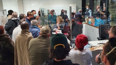 Passengers waiting on their Covid-19 test results at Schiphol Airport. (Reuters)