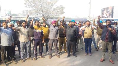 The Punbus and PRTC contractual employees’ union members rued that during the last meeting held with transport minister Amrinder Singh Raja Warring on November 22, the union members were assured that the cabinet will approve the resolution to regularise the employees. (HT Photo)