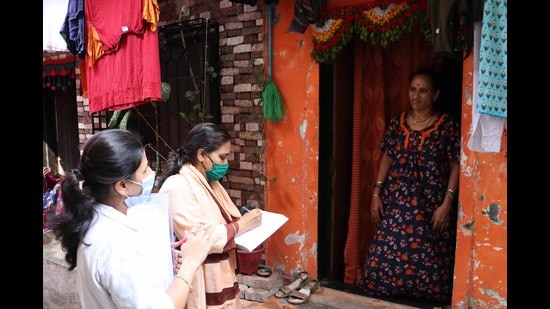 Kalyan Dombivli Municipal Corporation staff conduct door-to-door survey of its residents with regard to vaccination dose against Covid. (RISHIKESH CHOUDHARY/HT PHOTO)