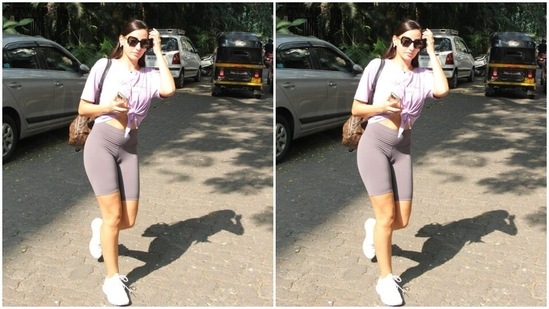 Nora paired a white tee shirt with a tie up detail in the front with a pair of grey gym shorts.(HT Photos/Varinder Chawla)