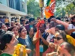Tripura Bharatiya Janata Party (BJP) President Rajib Bhattacharjee along with supporters celebrate BJP victory in the Municipal Elections, in Agartala on Sunday(ANI) Tripura Bharatiya Janata Party (BJP) President Rajib Bhattacharjee along with supporters celebrate BJP victory in the Municipal Elections, in Agartala on Sunday(ANI)