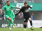 PSG's Lionel Messi, right, challenges for the ball with Saint-Etienne's Timothee Kolodziejczak during the French League One soccer between Saint-Etienne and Paris Saint Germain, in Saint-Etienne, central France, Sunday, Nov. 28, 2021. (AP) PSG's Lionel Messi, right, challenges for the ball with Saint-Etienne's Timothee Kolodziejczak during the French League One soccer between Saint-Etienne and Paris Saint Germain, in Saint-Etienne, central France, Sunday, Nov. 28, 2021. (AP)