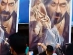 Salman Khan's fans spilling milk on his film Antim's posters. Salman Khan's fans spilling milk on his film Antim's posters.