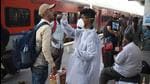 A health worker collects swab samples at Dadar Station in Mumbai. (Bhushan Koyande/HT Photo) A health worker collects swab samples at Dadar Station in Mumbai. (Bhushan Koyande/HT Photo)