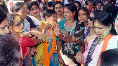 Supporters of Bharatiya Janata Party dance as they celebrate the party's initial lead during counting for the Tripura Municipal Corporation elections in Agartala on Sunday. (PTI PHOTO.) Supporters of Bharatiya Janata Party dance as they celebrate the party's initial lead during counting for the Tripura Municipal Corporation elections in Agartala on Sunday. (PTI PHOTO.)