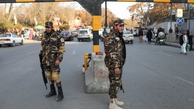 Taliban fighters guard a street in Kabul, Afghanistan. (REUTERS)