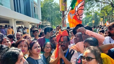 Tripura Bharatiya Janata Party (BJP) President Rajib Bhattacharjee along with supporters celebrate BJP victory in the Municipal Elections, in Agartala on Sunday (ANI) Tripura Bharatiya Janata Party (BJP) President Rajib Bhattacharjee along with supporters celebrate BJP victory in the Municipal Elections, in Agartala on Sunday (ANI)