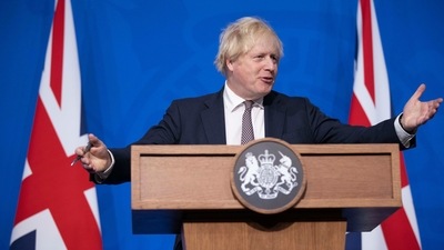Britain's Prime Minister Boris Johnson speaks during a press conference in London. (AP)