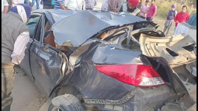 The mangled remains of the car in front of Chandigarh University in Gharuan, Mohali, on Sunday afternoon. (HT Photo)