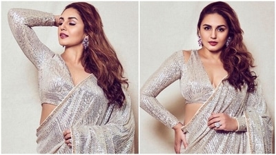 Sequinned sarees have been the standout look this wedding season. From brides to wedding guests, everyone is embracing this style like the IT trend. Even Bollywood divas have fallen in love with it, including Kareena Kapoor Khan, Malaika Arora, Janhvi Kapoor and more. The latest star to stun us with her version of the sequin saree is Huma Qureshi. (Instagram/@iamhumaq) Sequinned sarees have been the standout look this wedding season. From brides to wedding guests, everyone is embracing this style like the IT trend. Even Bollywood divas have fallen in love with it, including Kareena Kapoor Khan, Malaika Arora, Janhvi Kapoor and more. The latest star to stun us with her version of the sequin saree is Huma Qureshi. (Instagram/@iamhumaq)