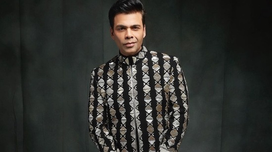 Taking to his social media handle, Karan shared a slew of pictures from his recent photoshoot that showed him making heads turn with his ravishing ethnic style.(Instagram/karanjohar)