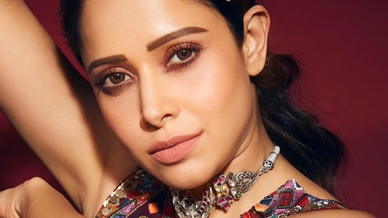 The pictures featured the Bollywood diva donning an indigo blue blouse that was made of crepe base and came with multi-coloured thread hand embroidery(Instagram/nushrrattbharuccha)