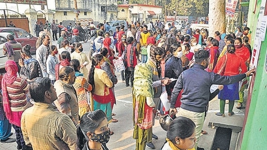 Moradabad: Candidates wait outside an examintaion centre to appear in Uttar Pradesh Teacher Eligibility Test 2021 (UPTET Exam 2021), in Moradabad, Sunday, Nov. 28, 2021. The examination has been cancelled due to alleged paper leak. (PTI Photo) (PTI11_28_2021_000031A) (PTI) Moradabad: Candidates wait outside an examintaion centre to appear in Uttar Pradesh Teacher Eligibility Test 2021 (UPTET Exam 2021), in Moradabad, Sunday, Nov. 28, 2021. The examination has been cancelled due to alleged paper leak. (PTI Photo) (PTI11_28_2021_000031A) (PTI)
