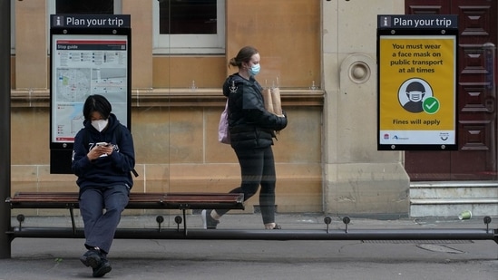 People wear protective face masks in the city centre during the coronavirus disease (Covid-19) outbreak in Sydney, Australia.&nbsp;(File Photo / REUTERS)