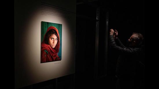 She’s probably the best recognised Afghan woman ever; the girl with the startling green eyes on National Geographic’s cover in 1984 (AFP) She’s probably the best recognised Afghan woman ever; the girl with the startling green eyes on National Geographic’s cover in 1984 (AFP)